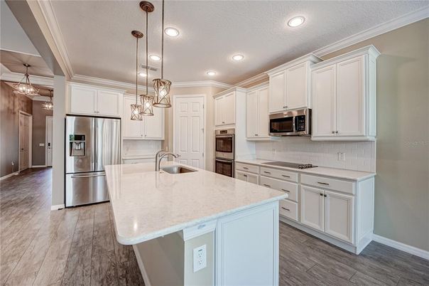 Interior, Kitchen, Pendant Lights, Recessed Lighting, Stainless Steel Appliances, Wood Texture Flooring