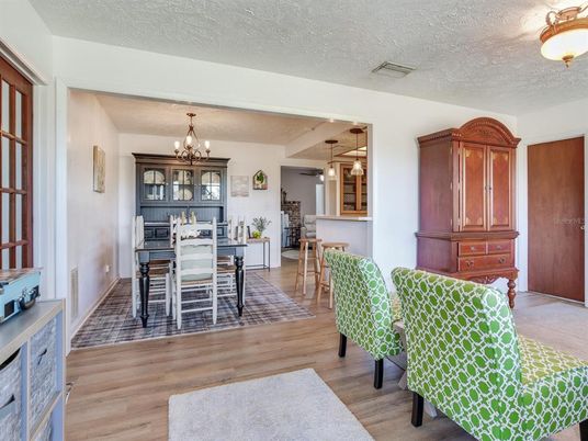 Chandelier, Dining room, Interior, Wood Texture Flooring