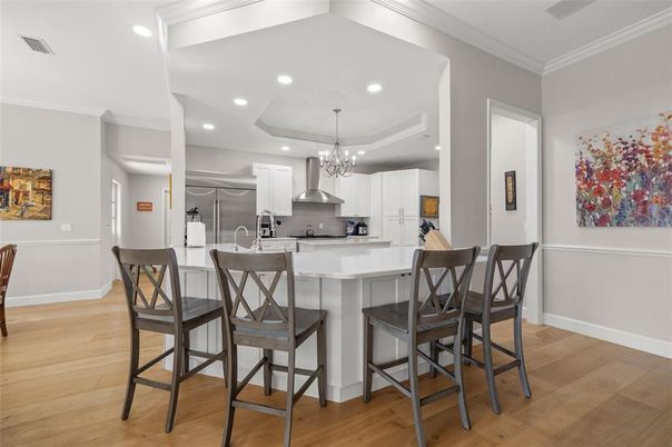 Chandelier, Interior, Kitchen, Recessed Lighting, Stainless Steel Appliances, Wood Texture Flooring