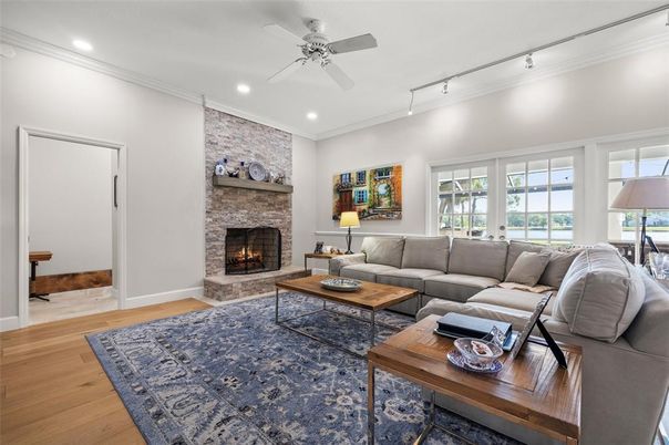 Fireplace, Interior, Living room, Recessed Lighting, Stone Walls, Wood Texture Flooring