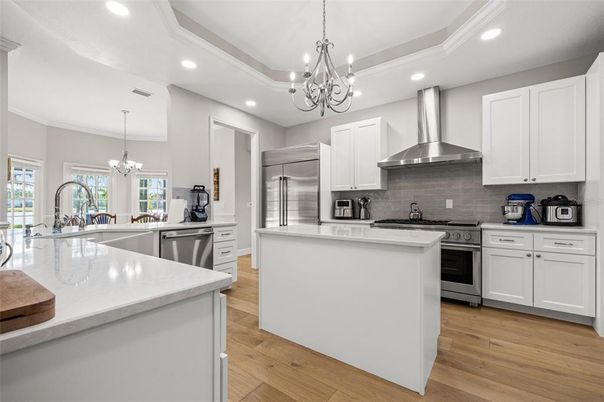 Chandelier, Interior, Kitchen, Recessed Lighting, Stainless Steel Appliances, Wood Texture Flooring