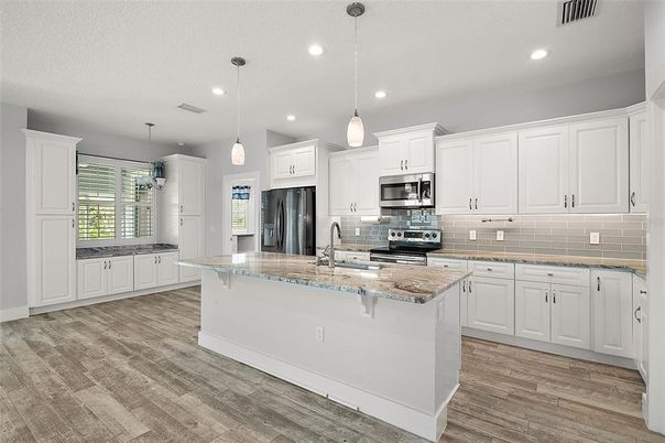 Interior, Kitchen, Pendant Lights, Recessed Lighting, Stainless Steel Appliances, Wood Texture Flooring
