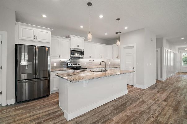 Interior, Kitchen, Pendant Lights, Recessed Lighting, Stainless Steel Appliances, Wood Texture Flooring