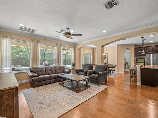 Dining room, Interior, Kitchen, Living room, Pendant Lights, Recessed Lighting, Stainless Steel Appliances, Wood Texture Flooring