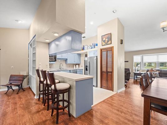 Dining room, Interior, Kitchen, Recessed Lighting, Stainless Steel Appliances, Wood Texture Flooring