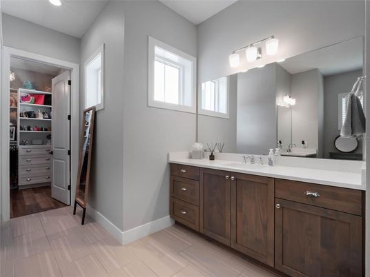 Bathroom, Dual Sink Vanities, Interior, Recessed Lighting, Walk-in Closets, Wood Texture Flooring