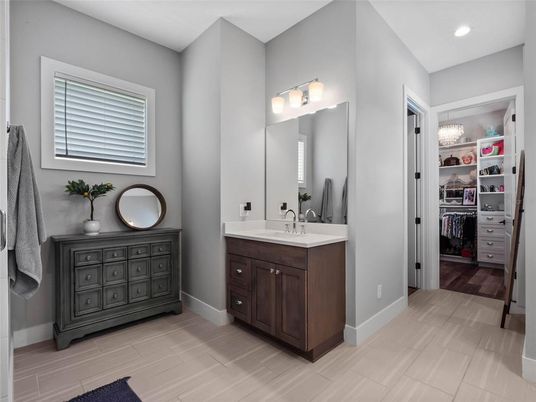 Bathroom, Dual Sink Vanities, Interior, Recessed Lighting, Walk-in Closets, Wood Texture Flooring