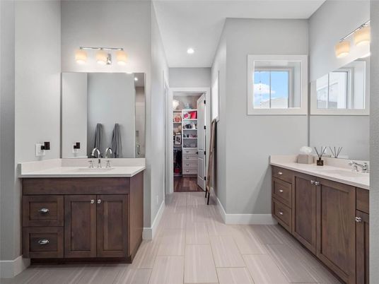 Bathroom, Dual Sink Vanities, Interior, Recessed Lighting, Walk-in Closets