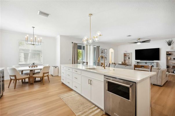 Dining room, Interior, Kitchen, Living room, Pendant Lights, Stainless Steel Appliances, Wood Texture Flooring