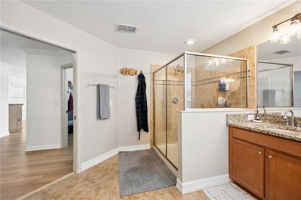 Bathroom, Glass Shower, Interior, Recessed Lighting, Wood Texture Flooring