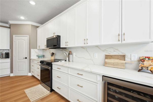 Interior, Kitchen, Marble Walls, Recessed Lighting, Wood Texture Flooring