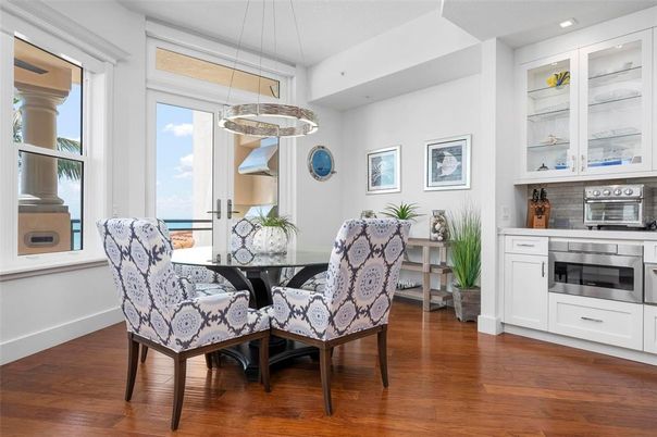 Dining room, Interior, Kitchen, Pendant Lights, Recessed Lighting, Stainless Steel Appliances, Wood Texture Flooring