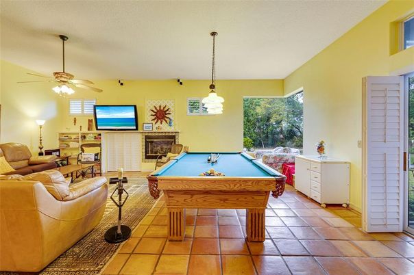 Billiard Table, Fireplace, Game Room, Interior, Living room, Pendant Lights