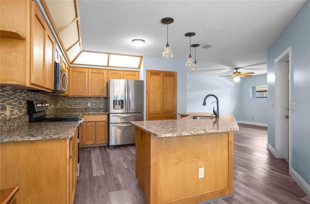 Interior, Kitchen, Pendant Lights, Stainless Steel Appliances, Wood Texture Flooring