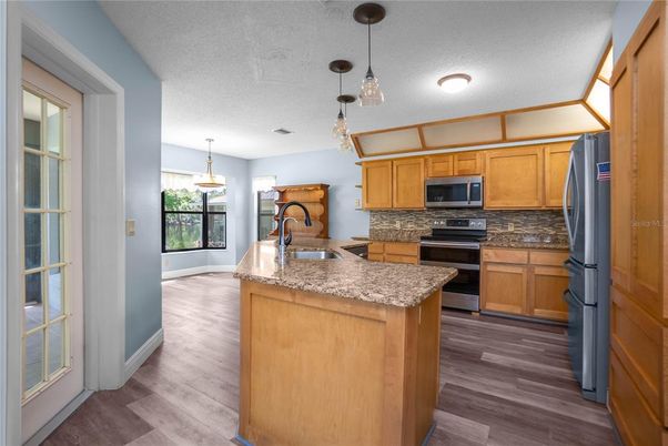 Interior, Kitchen, Pendant Lights, Stainless Steel Appliances, Wood Texture Flooring