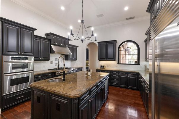 Chandelier, Interior, Kitchen, Recessed Lighting, Stainless Steel Appliances, Wood Texture Flooring