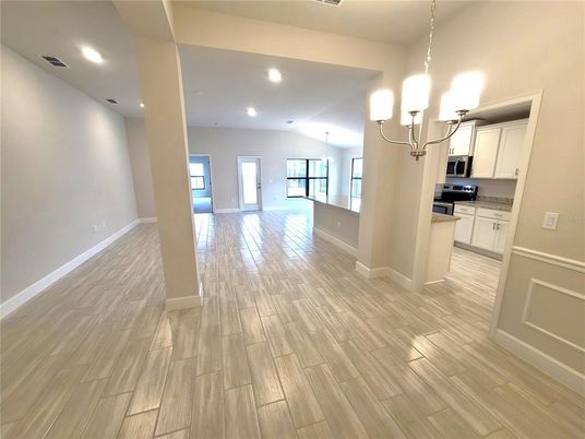 Chandelier, Empty room, Interior, Kitchen, Recessed Lighting, Wood Texture Flooring