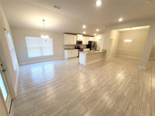 Chandelier, Interior, Kitchen, Pendant Lights, Recessed Lighting, Stainless Steel Appliances, Wood Texture Flooring