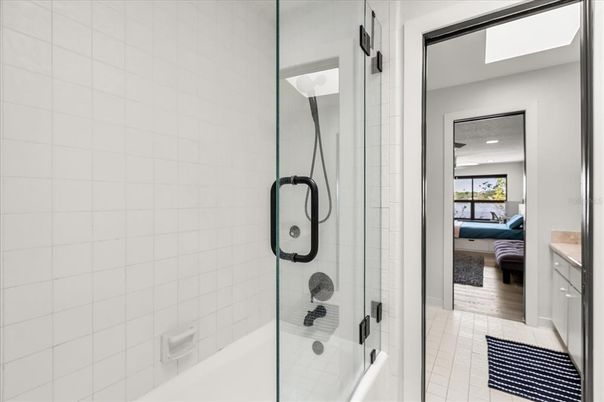 Bathroom, Bedroom, Glass Shower, Interior, Recessed Lighting, Wood Texture Flooring