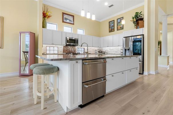Interior, Kitchen, Pendant Lights, Recessed Lighting, Stainless Steel Appliances, Wood Texture Flooring