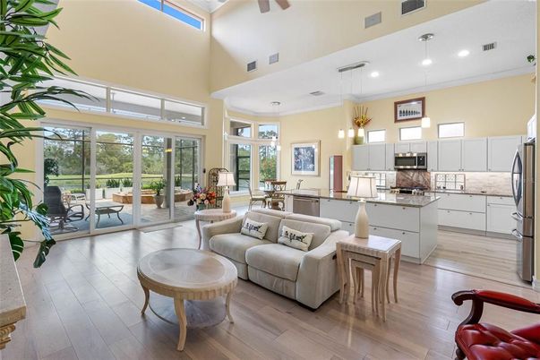 Dining room, Interior, Kitchen, Living room, Pendant Lights, Recessed Lighting, Stainless Steel Appliances, Wood Texture Flooring