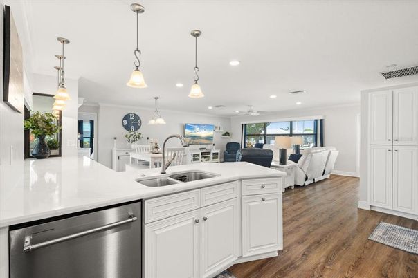 Dining room, Interior, Kitchen, Living room, Pendant Lights, Recessed Lighting, Stainless Steel Appliances, Wood Texture Flooring