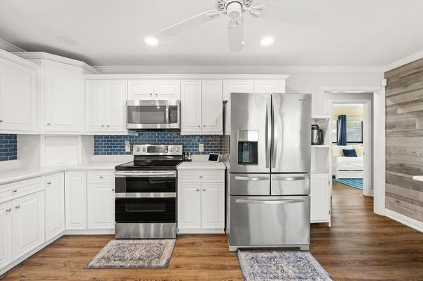 Interior, Kitchen, Recessed Lighting, Stainless Steel Appliances, Wood Texture Flooring