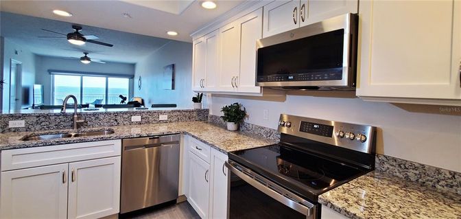 Interior, Kitchen, Recessed Lighting, Stainless Steel Appliances, Water, Wood Texture Flooring