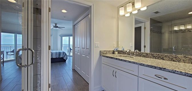Bathroom, Bedroom, Dual Sink Vanities, Interior, Recessed Lighting, Water, Wood Texture Flooring