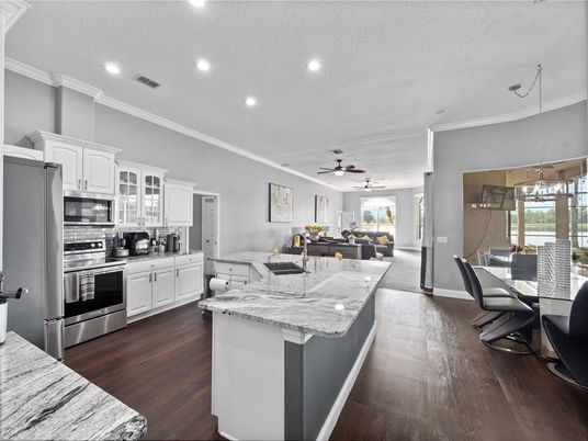 Dining room, Interior, Kitchen, Living room, Pendant Lights, Recessed Lighting, Stainless Steel Appliances, Wood Texture Flooring