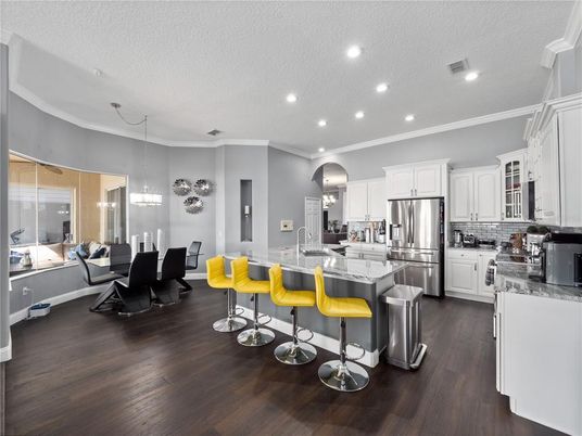 Dining room, Interior, Kitchen, Pendant Lights, Recessed Lighting, Stainless Steel Appliances, Wood Texture Flooring