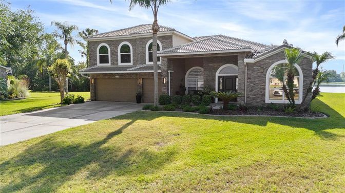 Attached, Backyard, Exterior, Facade, Brick Facade, Mediterranean