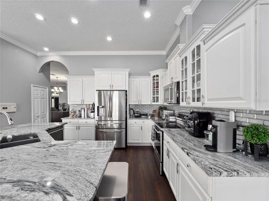 Chandelier, Interior, Kitchen, Recessed Lighting, Stainless Steel Appliances, Wood Texture Flooring