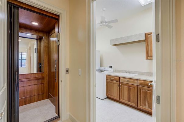 Elevator, Interior, Recessed Lighting, Washer, Wooden Ceilings, Wooden Walls