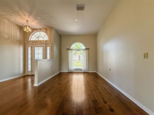 Chandelier, Empty room, Interior, Recessed Lighting, Wood Texture Flooring