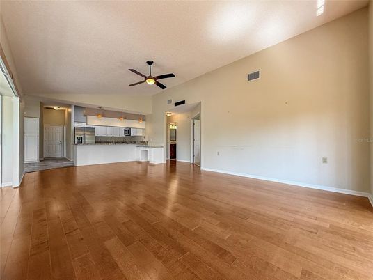 Empty room, Interior, Kitchen, Stainless Steel Appliances, Wood Texture Flooring