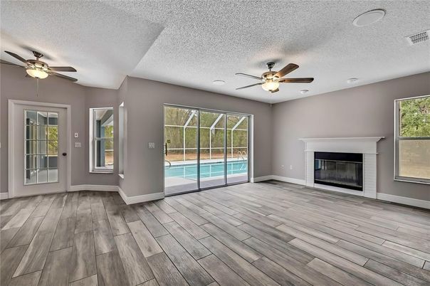 Empty room, Fireplace, Interior, Recessed Lighting, Wood Texture Flooring
