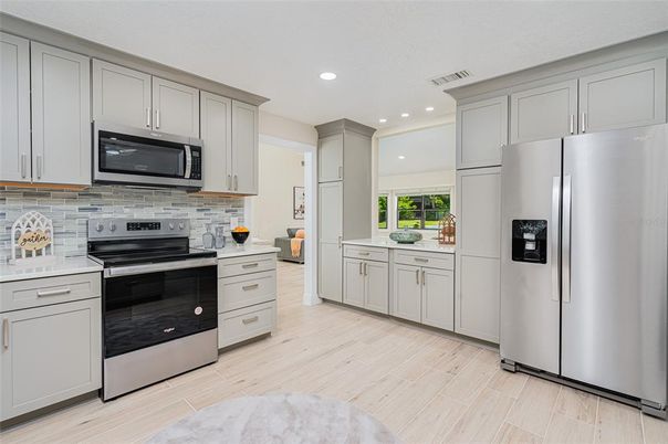 Interior, Kitchen, Recessed Lighting, Stainless Steel Appliances, Wood Texture Flooring