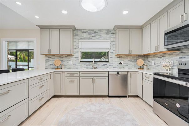 Interior, Kitchen, Recessed Lighting, Stainless Steel Appliances, Stone Walls, Wood Texture Flooring