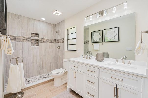 Bathroom, Dual Sink Vanities, Interior, Recessed Lighting, Wood Texture Flooring