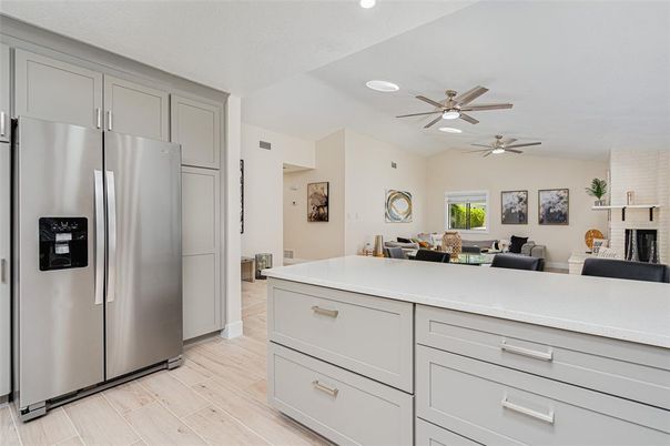 Dining room, Interior, Kitchen, Recessed Lighting, Stainless Steel Appliances, Wood Texture Flooring