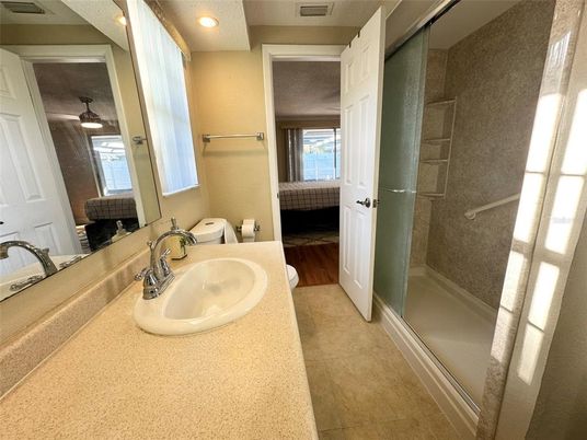 Bathroom, Glass Shower, Interior, Recessed Lighting, Wood Texture Flooring
