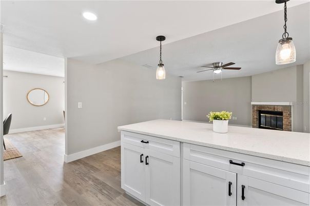 Fireplace, Interior, Pendant Lights, Recessed Lighting, Wood Texture Flooring