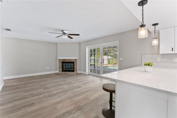 Empty room, Fireplace, Interior, Pendant Lights, Wood Texture Flooring