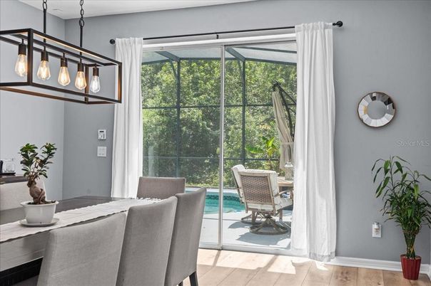 Dining room, Glass Ceilings, Interior, Pendant Lights, Pool, Sun Room, Wood Texture Flooring