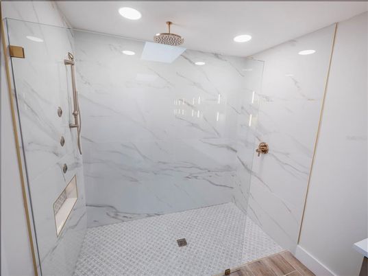 Bathroom, Glass Shower, Interior, Marble Walls, Recessed Lighting, Wood Texture Flooring