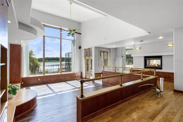 Fireplace, Interior, Recessed Lighting, Water, Wood Texture Flooring