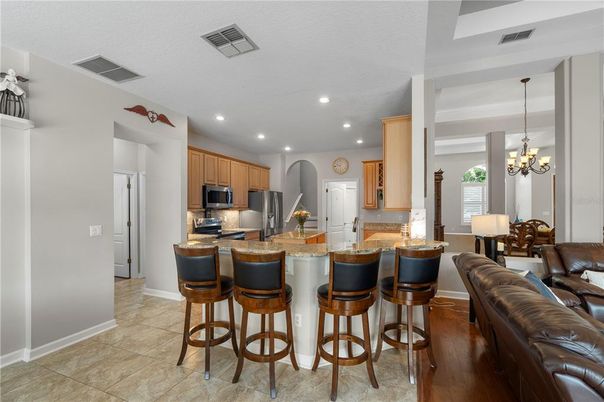 Chandelier, Dining room, Interior, Kitchen, Living room, Recessed Lighting, Stainless Steel Appliances