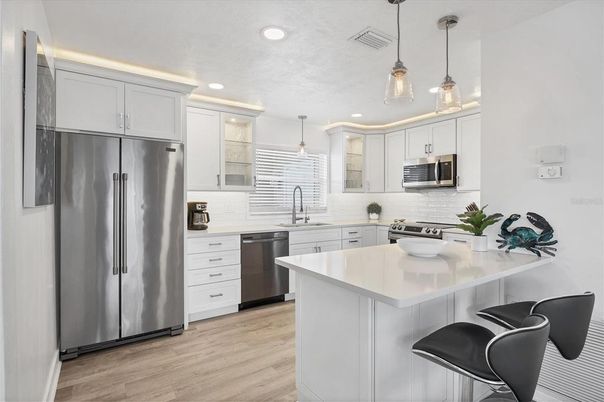 Interior, Kitchen, Pendant Lights, Recessed Lighting, Stainless Steel Appliances, Wood Texture Flooring