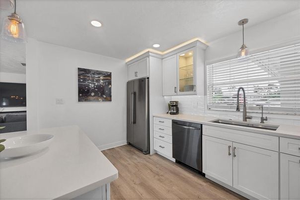 Interior, Kitchen, Pendant Lights, Recessed Lighting, Stainless Steel Appliances, Wood Texture Flooring
